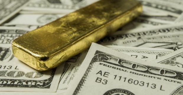 Золото дорожчає на тлі посилення долара нова вартість металу